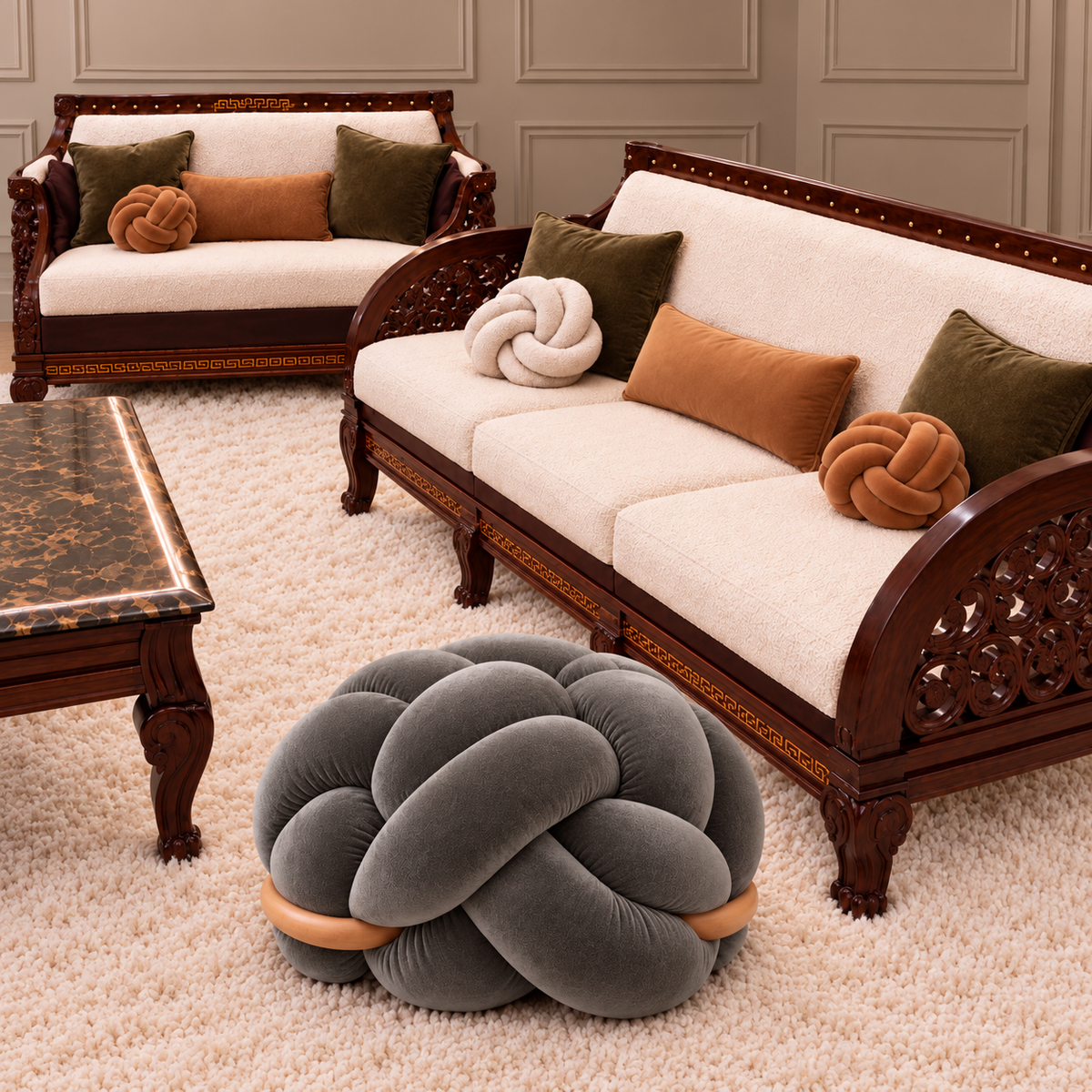 Classic lounge styling with knot cushions and grey knot pouf