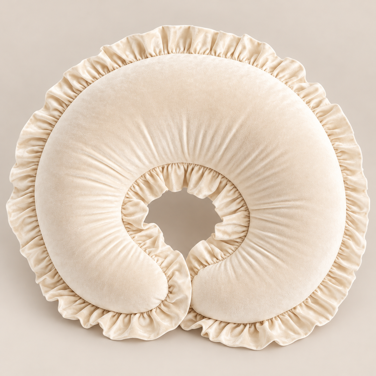 Cream velvet nursing pillow with gathered ruffle trim, 24 by 20 inches excluding ruffles