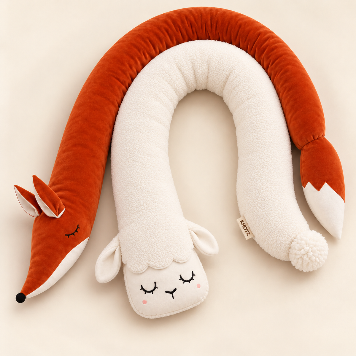KNOTZ rust velvet fox and ivory terry sheep long cushion duo
